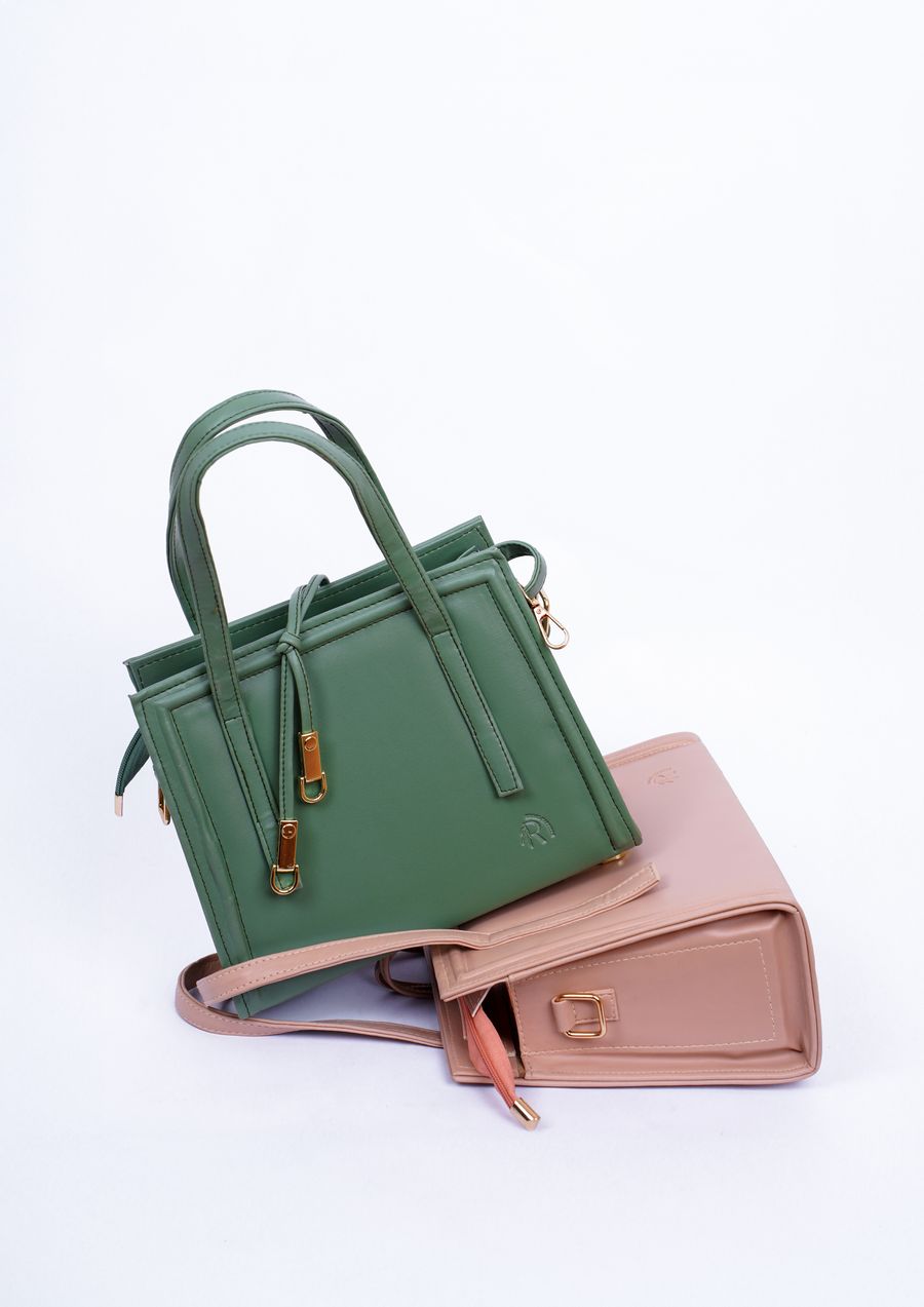 Two handbags, a green tote and a blush shoulder bag